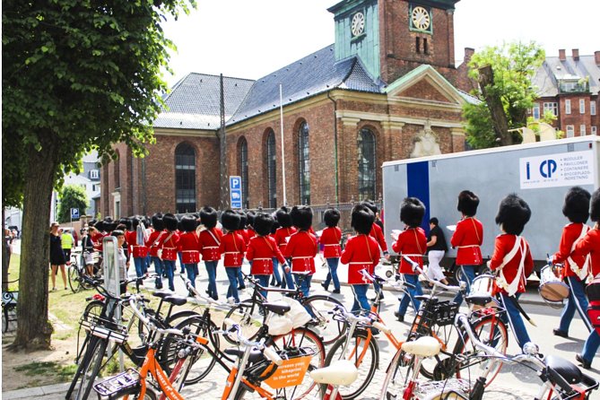 Copenhagen 2-hour City Highlights Bike Tour - What you get on the tour, from bikes and ponchos to a live guide