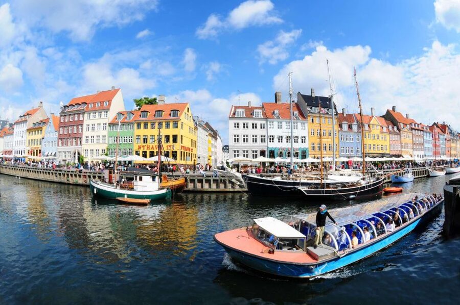 Copenhagen: Canal Boat Cruise & Old Town/Nyhavn Walking Tour - The Old Town walk: City Hall, Cathedral, Round Tower, and story time