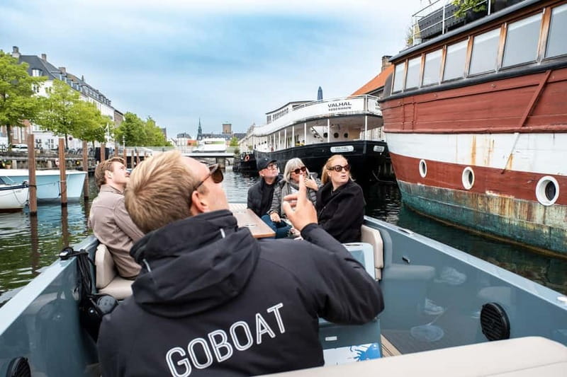 Copenhagen: Electric Canal Tour with Guide and Hot Drink - Nyhavn, Amalienborg, and the Opera House: iconic views from the water