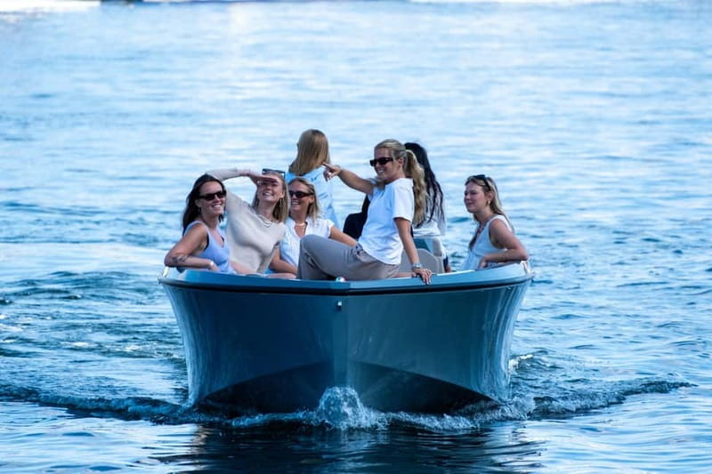 Copenhagen: Electric Canal Tour with Guide and Hot Drink - Boarding at Islands Brygge: how the 1-hour ride is structured
