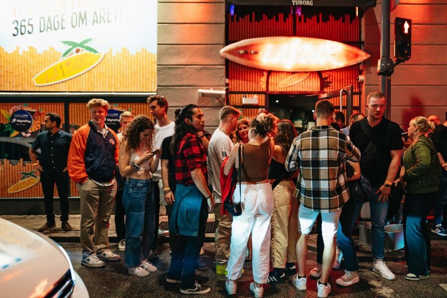 Copenhagen: Guided Party Pub Crawl with 4 Shots and 1 Drink - Included drinks, coatcheck, and photos: where the value comes from