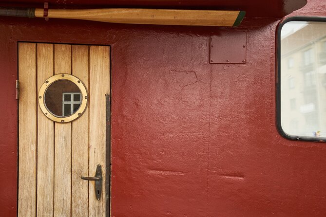 Copenhagen Hidden Gems PhotoWalk tour - Christianshavn & Houseboats - Stop 1 in Christianshavn: canals, old buildings, street life, and houseboats