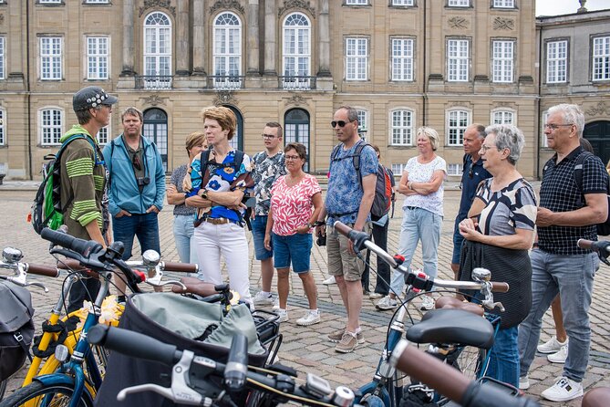Copenhagen Highlights 3 Hour Bike Tour with local Guide - Kongens Nytorv and the Royal Danish Theatre: grand squares with street life