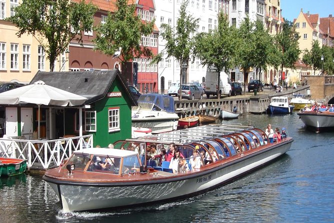 Copenhagen Sightseeing Classic Canal Tour With Live Guide - The cruise vibe: indoor comfort, outdoor views, and bridge moments