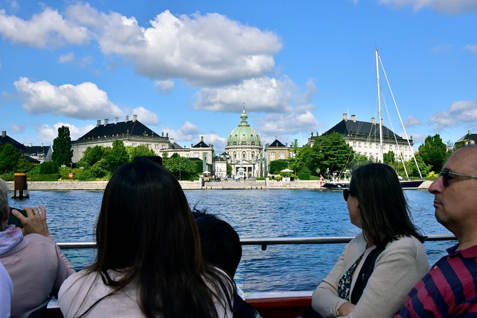 Copenhagen Sightseeing Classic Canal Tour With Live Guide - Amalienborg Castle pass-by: the royal Denmark moment, seen fast