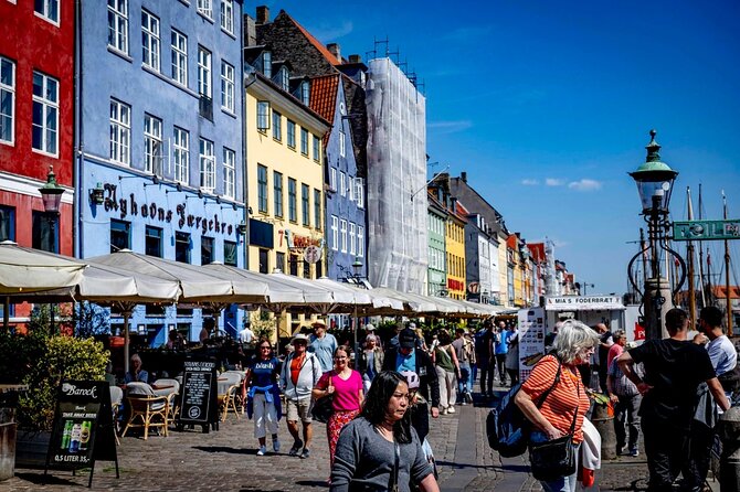 Discover Copenhagen Iconic Landmarks and Hidden Gems Walking Tour - Nyhavn Canal Walk: colorful houses and a classic Copenhagen scene