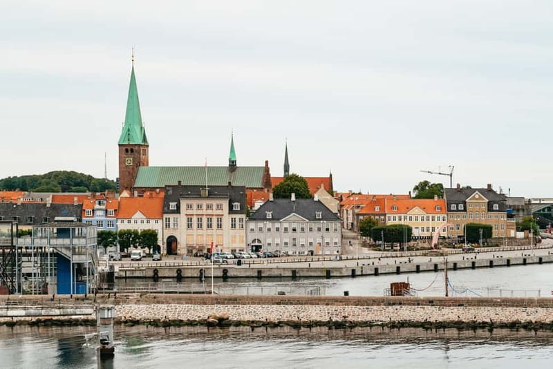 From Copenhagen: Lund and Malmö 2-Country Tour - Lund Cathedral and the 1700s lanes behind the spires