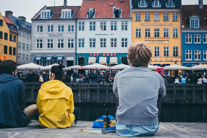 Hygge Walk in Copenhagen with a Local - Lively canal scenes and the underwater mermen moment