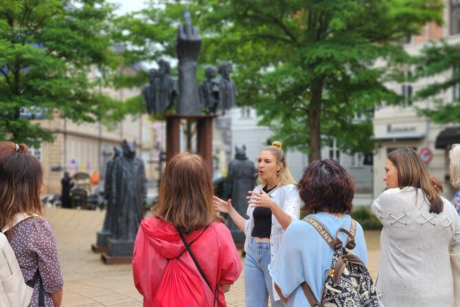 Private Walk & Canal Tour: Highlights + Changing of the Guards - The Havnebussen electric ferry ride, plus the Børsen story
