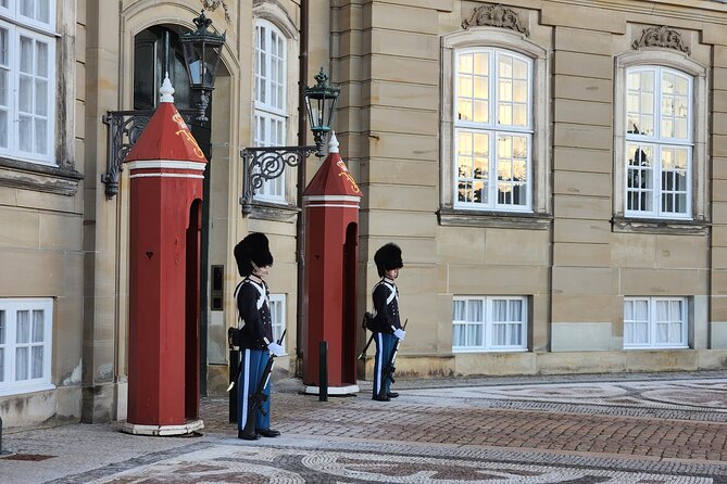 Walk & Canal Tour: Copenhagen Highlights + Changing of the Guards - Tivoli Gardens exterior stop, a quick taste of Danish play